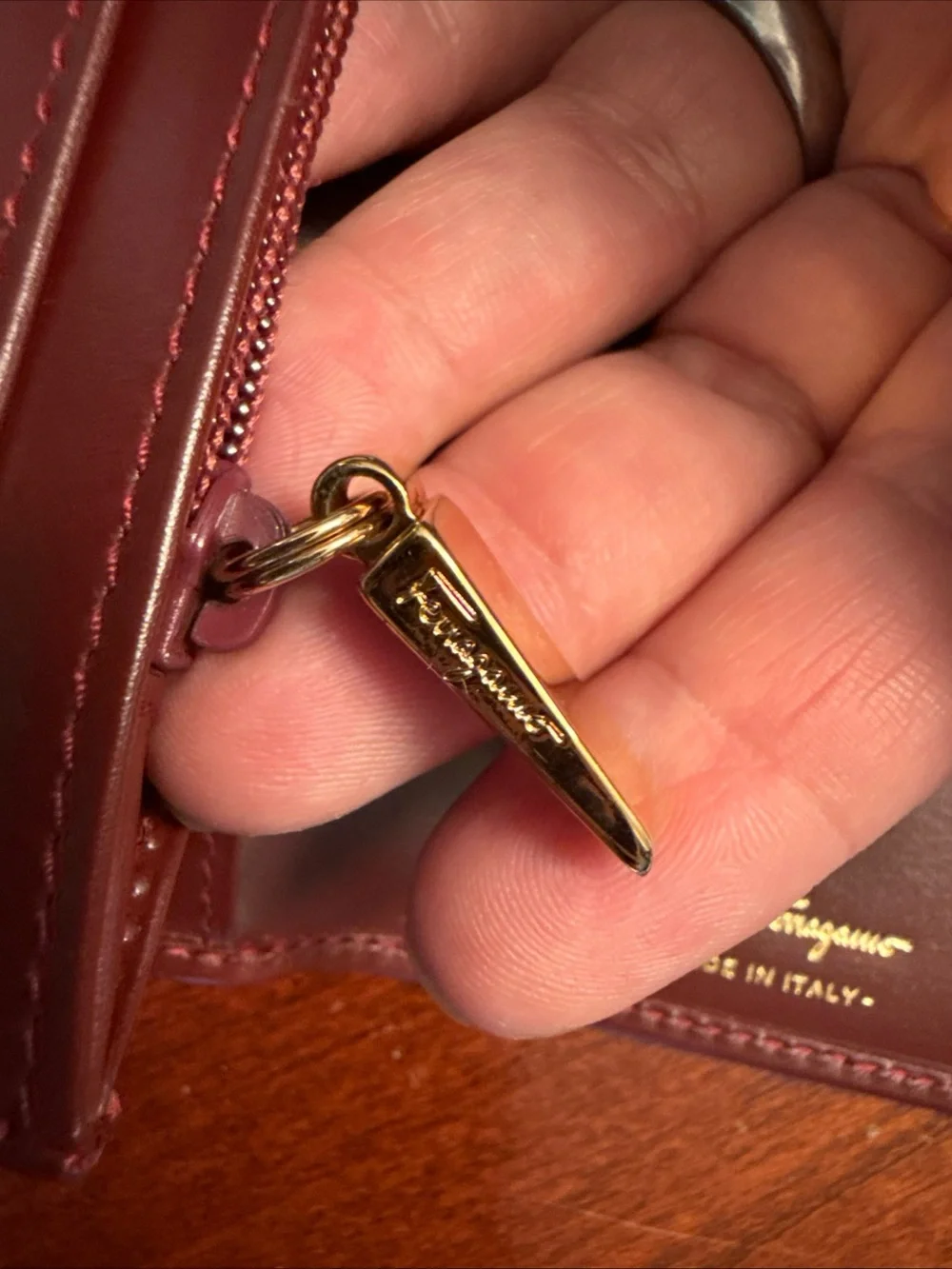 Salvatore Ferragamo Burgundy Leather Wallet with Gold Hardware